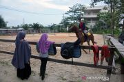 Melihat aksi Joki Cilik di Pekanbaru