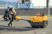 Perbaiki jalan trans Sulawesi
