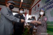 BAKAMLA DISTRIBUSIKAN BANTUAN COAVID-19 DI SANGIHE