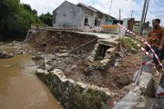 Tanggul Jebol Akibat Banjir Bandang