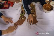 Lukisan Tanah Liat Simbol Pemersatu Budaya di Poso