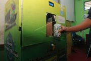 Inovasi alat pemilah sampah berkonsep ATM