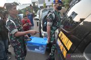 KPK dan Puspom TNI geledah kantor Basarnas