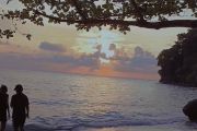 Pantai Enu menawarkan pesona sunset yang memukau