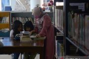 Mengisi libur sekolah di Perpustakaan