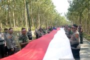 Pembentangan Bendera Merah Putih TNI-Polri&nbsp;