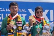 Diananda dan Riau Ega pastikan dua emas recurve perseorangan