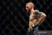 Justin Gaethje rebut gelar juara kelas ringan usai menang TKO atas Ilia Topuria di UFC Freedom 250