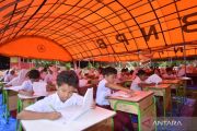 Sumatra schools struggle to resume classes after floods, landslides