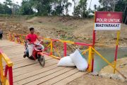 Sat Brimob Polda Sumbar rampungkan empat jembatan darurat di Agam