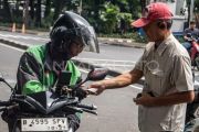 Pemerintah turunkan komisi tarif ojek daring