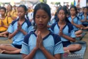 Pecahkan rekor MURI, 12.971 pelajar Bali serentak yoga asana