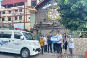 BRI Palembang salurkan bantuan mobil jenazah untuk Yayasan Buddhakirti