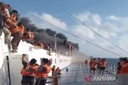 Nine vessels sent to rescue 250 people after ferry fire off East Java