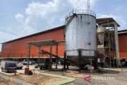 Village cooperative shifts from raw fruit sales to CPO production