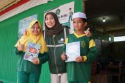 PLN UID Kalselteng salurkan 221 buku bagi siswa MI Nurul Islam Gambut