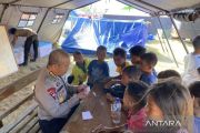 Police hold trauma-relief session for quake-hit children in NTT