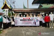 Kabut asap mengancam, Dinkes dan PMI Padang Panjang bagikan masker gratis ke pengendara