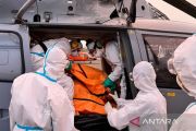 Search team recovers 11 more bodies after ship sinks in Java Sea