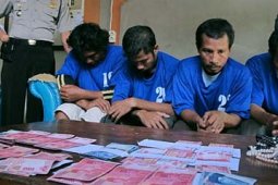 PENGEDAR UANG PALSU