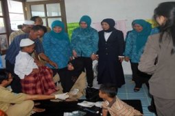 MENINJAU SUNATAN MASSAL