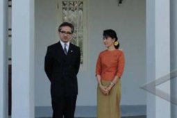 BERTEMU SUU KYI