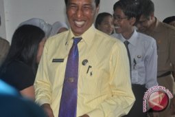 Bupati Bagikan Kartu Jamkesmas