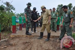 TINJAU TMMD LOK BUNTAR