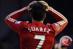 Dua gol Suarez menangkan Liverpool atas Wigan