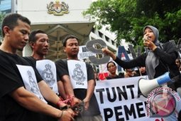 Aksi Kecam Malaysia