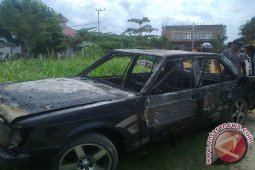 Sedan Hangus Terbakar di SPBU