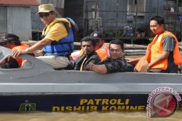 TANGGULANGI BANJIR DAN TANAH LONGSOR