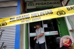 Perampok Bersenjata Api Gasak Kantor Pegadaian Oleh Amirullah