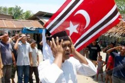 PENGIBARAN BENDERA ACEH