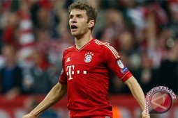 Dua gol Mueller pastikan Skotlandia tersingkir