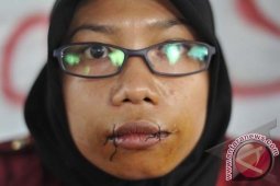 AKSI JAHIT MULUT