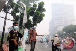 Penjual Masker Asap