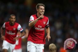 Arsenal dan Schalke Melaju Fase Grup Liga Champions