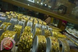 Emas Naik Setelah FED Pertahankan Stimulus