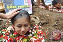 Aksi Kubur Diri