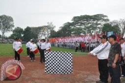 Kirab Seribu Bendera Merah-Putih Awali HUT Tabanan