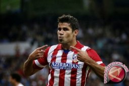 Atletico tempel Barcelona di puncak klasemen