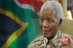 Pemakaman Nelson Mandela Satukan Pesaing