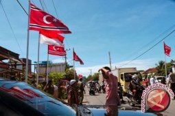 TNI dan POLRI Sita Bendera Bintang Bulan