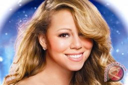 Lagu Natal Mariah Carey Tembus Satu Juta Kopi di Inggris