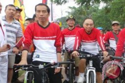 Jokowi bersepeda jadi berita di London