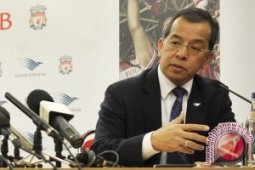 Laba Garuda anjlok 89,89 persen pada 2013