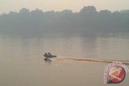Kabut Asap Selimuti Sungai Kapuas