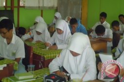 UN Di Kalsel Berjalan Lancar