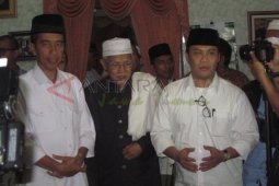 KH Azis Mansyur dan Jokowi